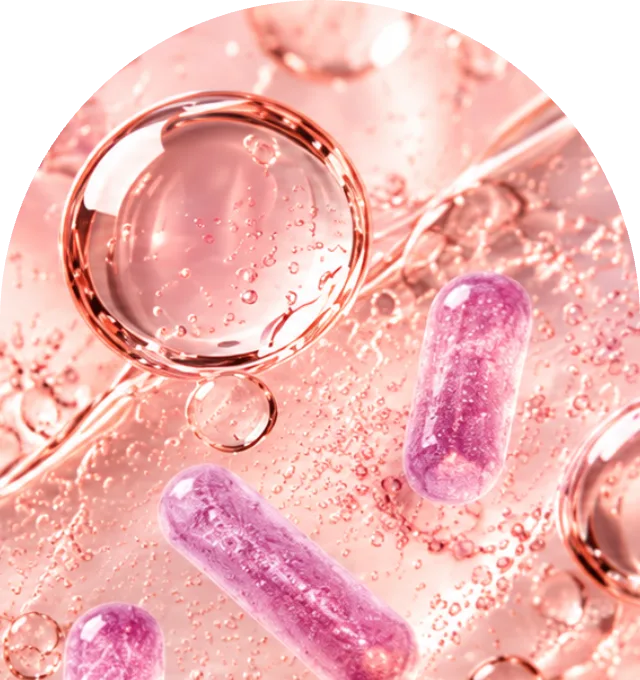 Capsules among pink bubbles